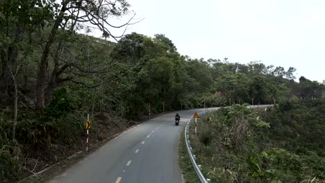Motorcycle Ride Through Winding Mountain Road