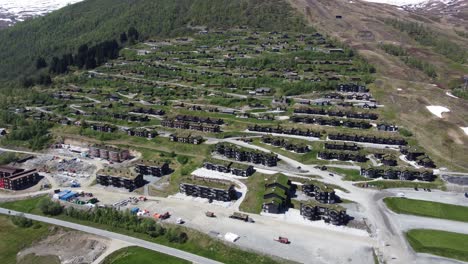 norwegian recreational homes in mountainside at myrkdalen mountain village - close to overview ascending aerial