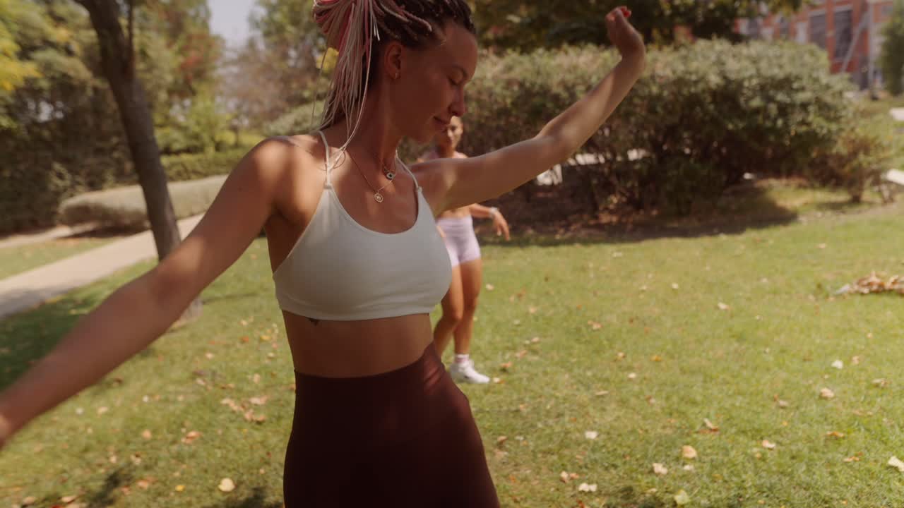 Women Exercising in a Park