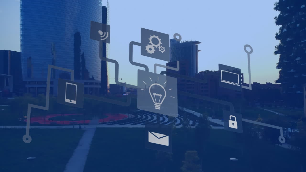 Network of multiple digital icons against view of cityscape