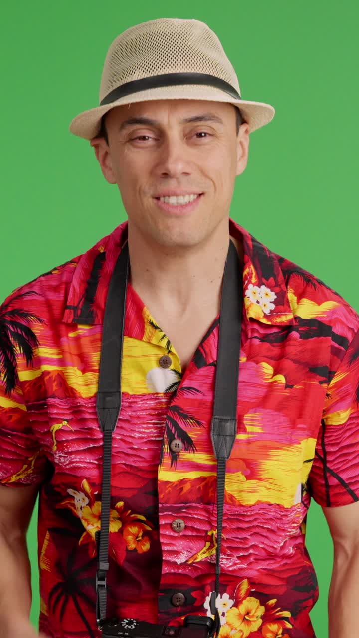 Happy tourist smiling on green screen background