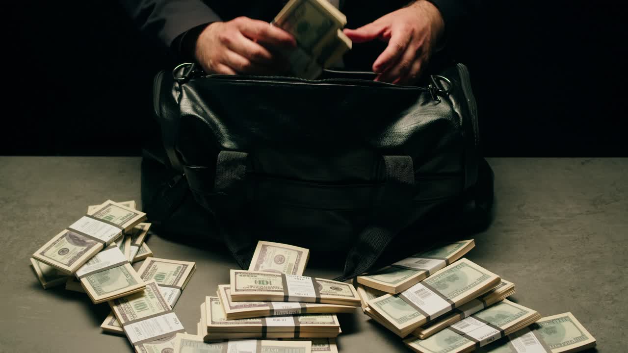 Specialised police officer Counting dollar banknotes in crime lab, conceptual image. High quality 4k footage