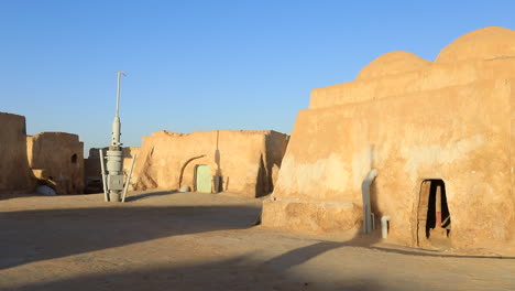 bright sunlight over star wars tatooine-like desert setting with clear sky