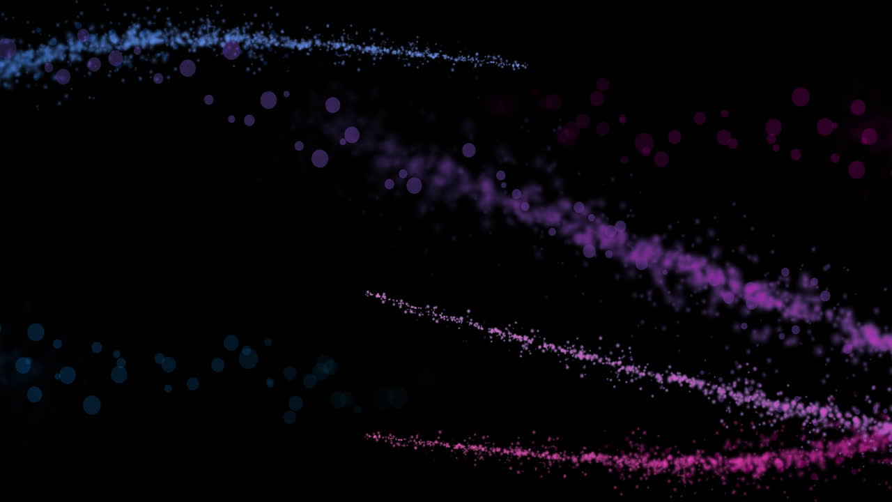 검은 바탕에 있는 다채로운 빛의 흔적과 반점들의 애니메이션