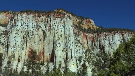 tall white rock cliffs in zion national park canyon landscape, utah