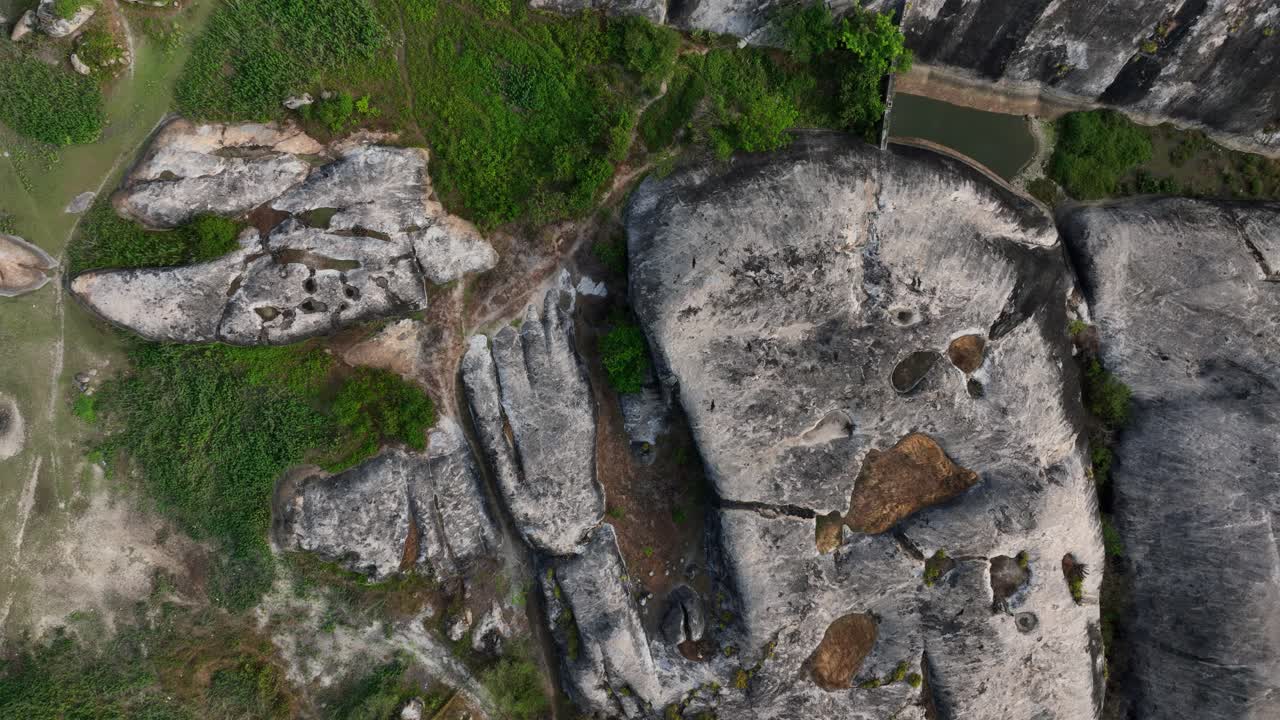 Aerial Top Down Spiraling View of Potholes in Bedrock - Rock Erosion