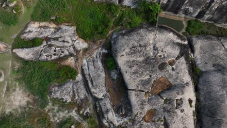 aerial top down spiraling view of potholes in bedrock - rock erosion