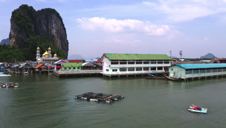Houses-and-fishing-nets-floating-on-sea-in-Koh-Panyee-fishing-village