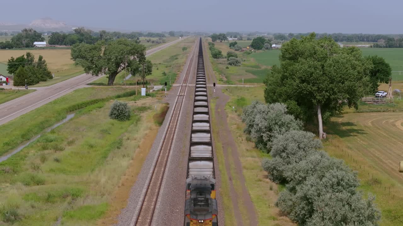 Freight train in Chimney Rock, NE, USA, rural landscape, sunny day
