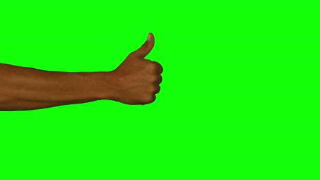 close up of hand gesturing thumbs up