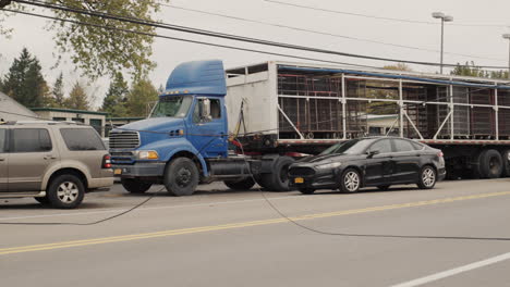 clarence, ny, usa, october 2021: cars bypass the break in the power supply cable, volunteers regulate traffic