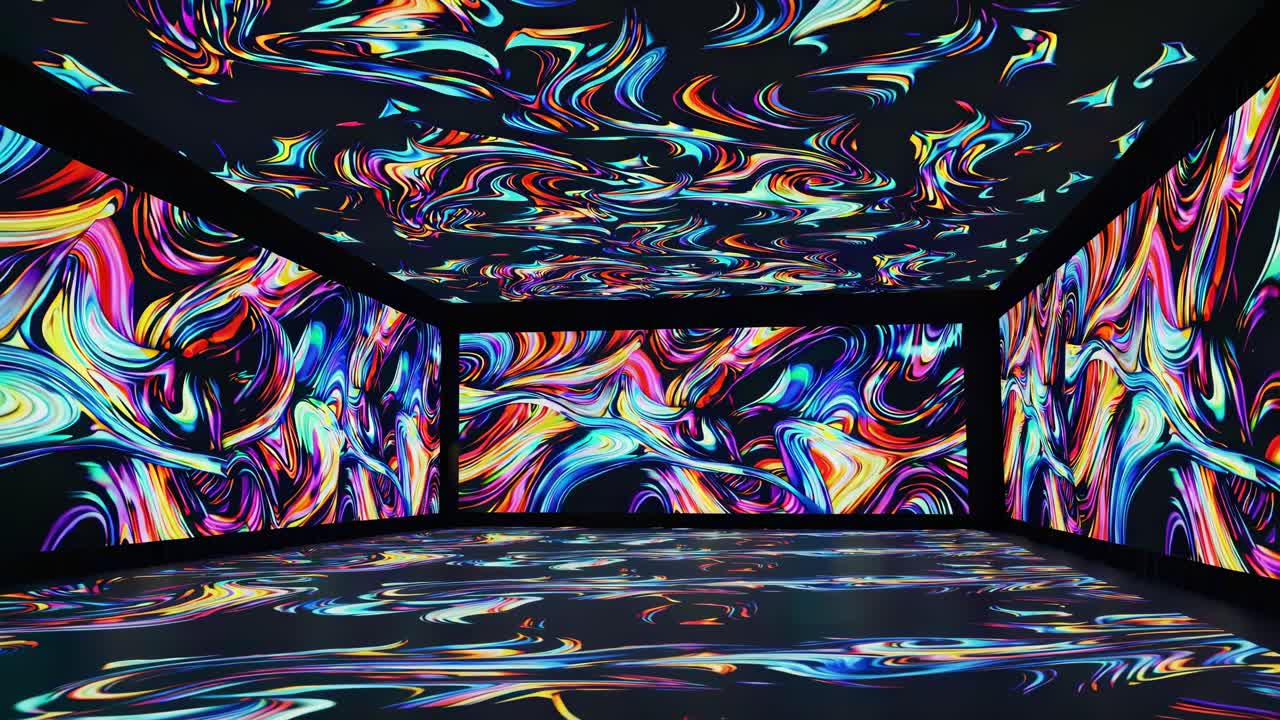 Immersive video art installation with swirling neon patterns on walls and floor