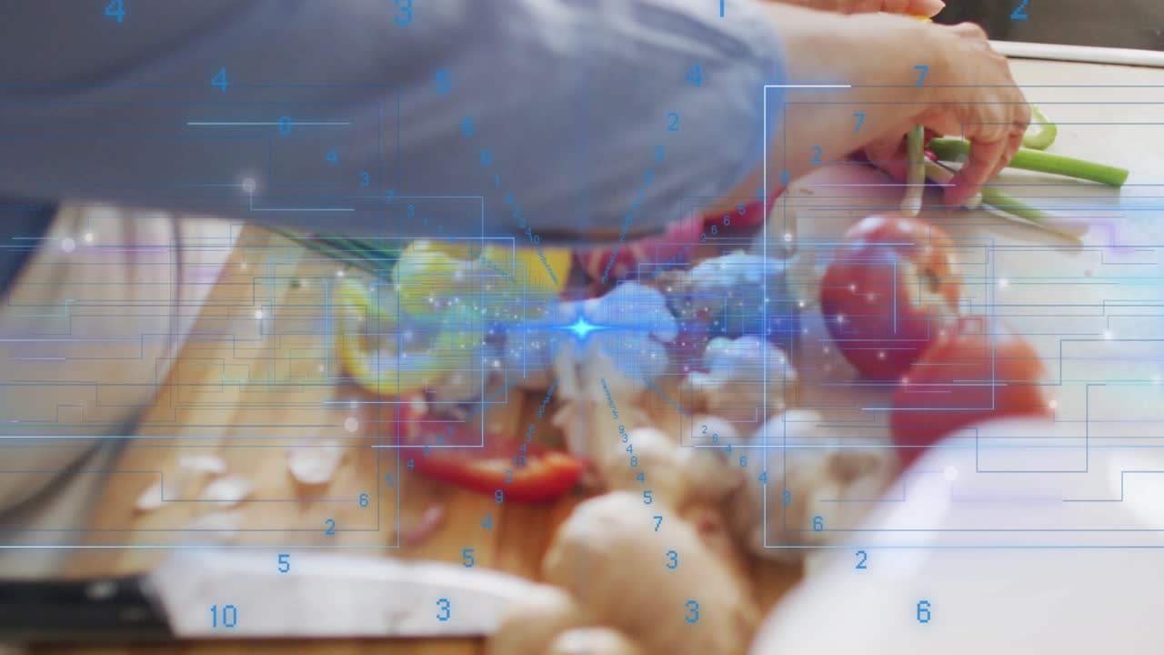 Home cook touching pepper rings on cutting board, sliding spring onions into tidy piles for cooking
