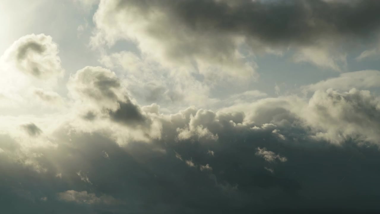 Dramatic Clouds Moving Across the Sky at Sunset