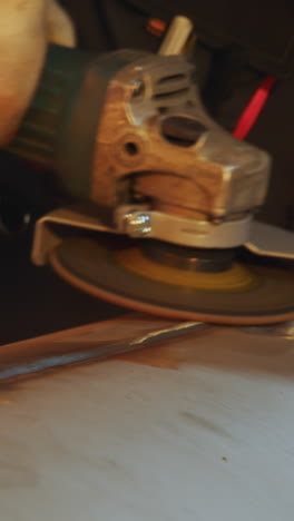 close-up of angle grinder working on metal
