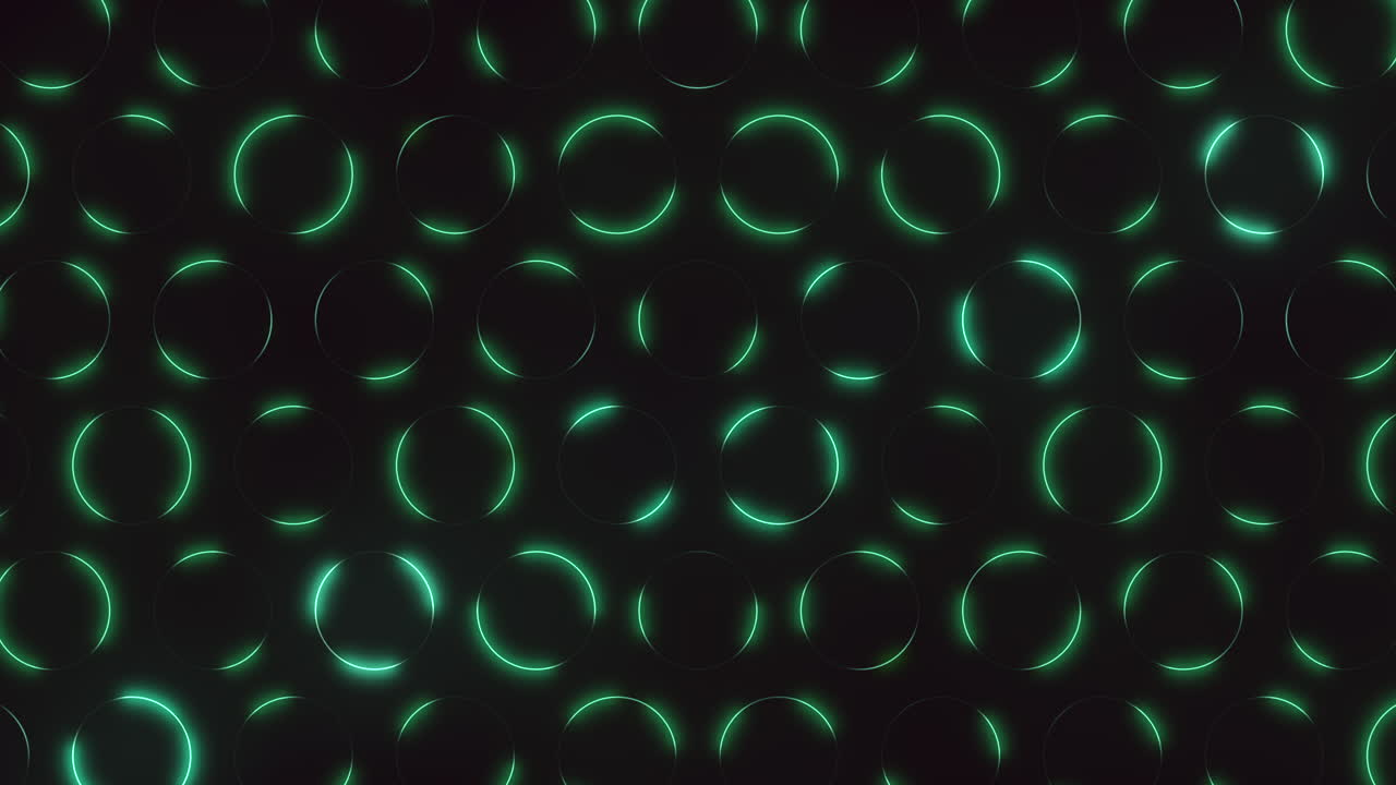 A striking image of glowing green circles set against a black background. The circles create a mesmerizing and engaging pattern that captivates the eye