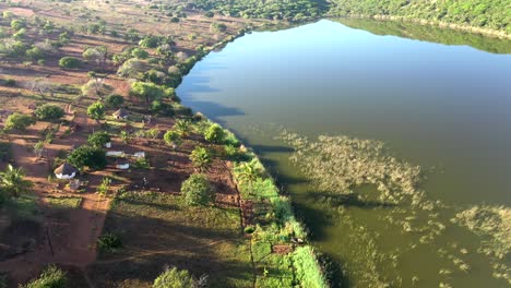 forward flying cinematic shot of chidenguele village showcasing matsambe lake