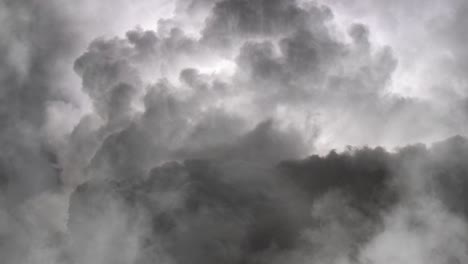 zoom in, dark clouds and thunderstorms