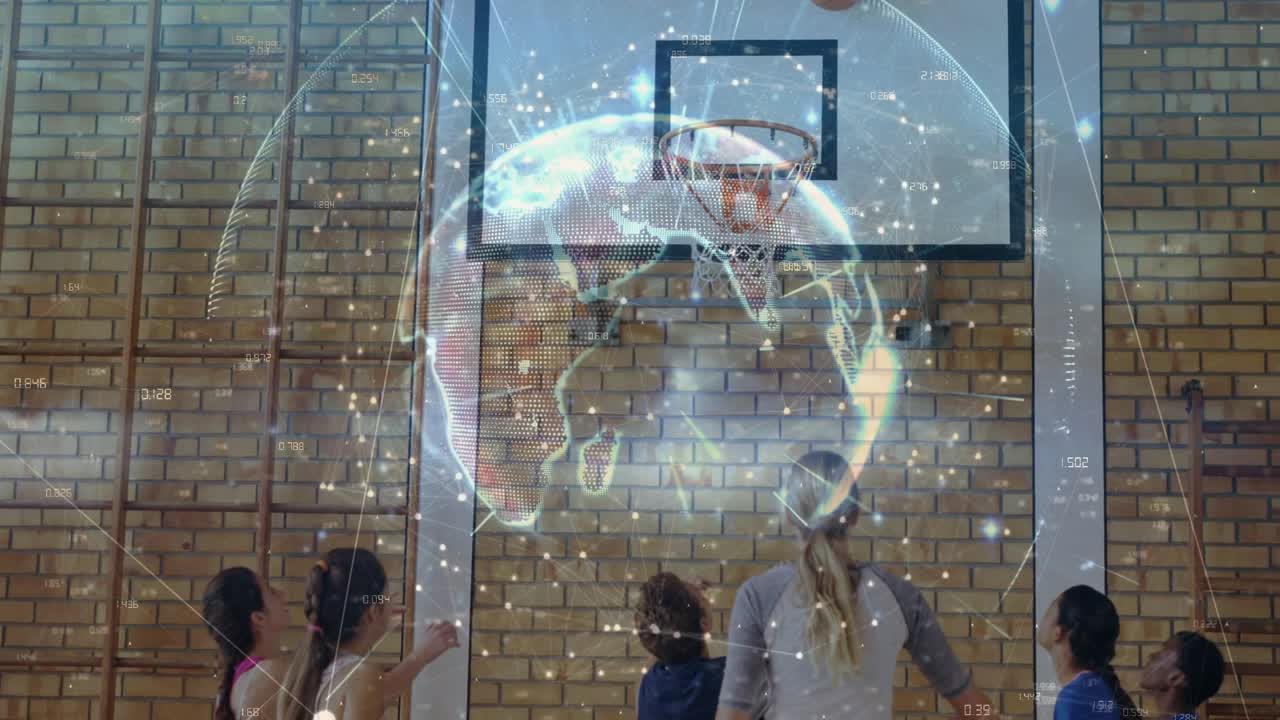 Left shooting ball, team tracking while blue player leaping in PE drill, globe sparkling above hoop