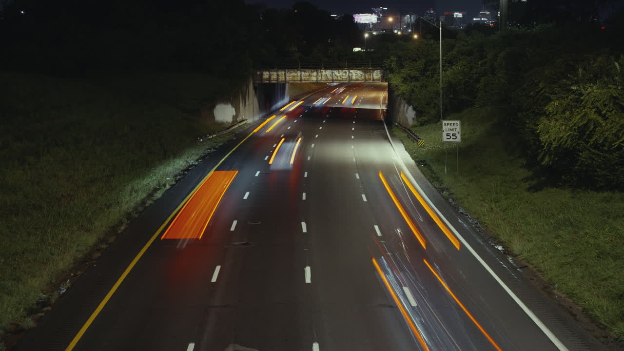 Night Highway Traffic Under Overpass