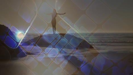 animación de cuadrados azules sobre mujer caucásica practicando yoga en la playa