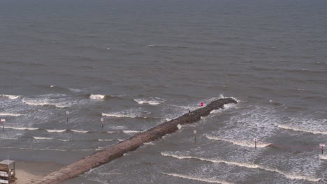 Drone-view-of-Galveston-Beach-in--Galveston,-Texas