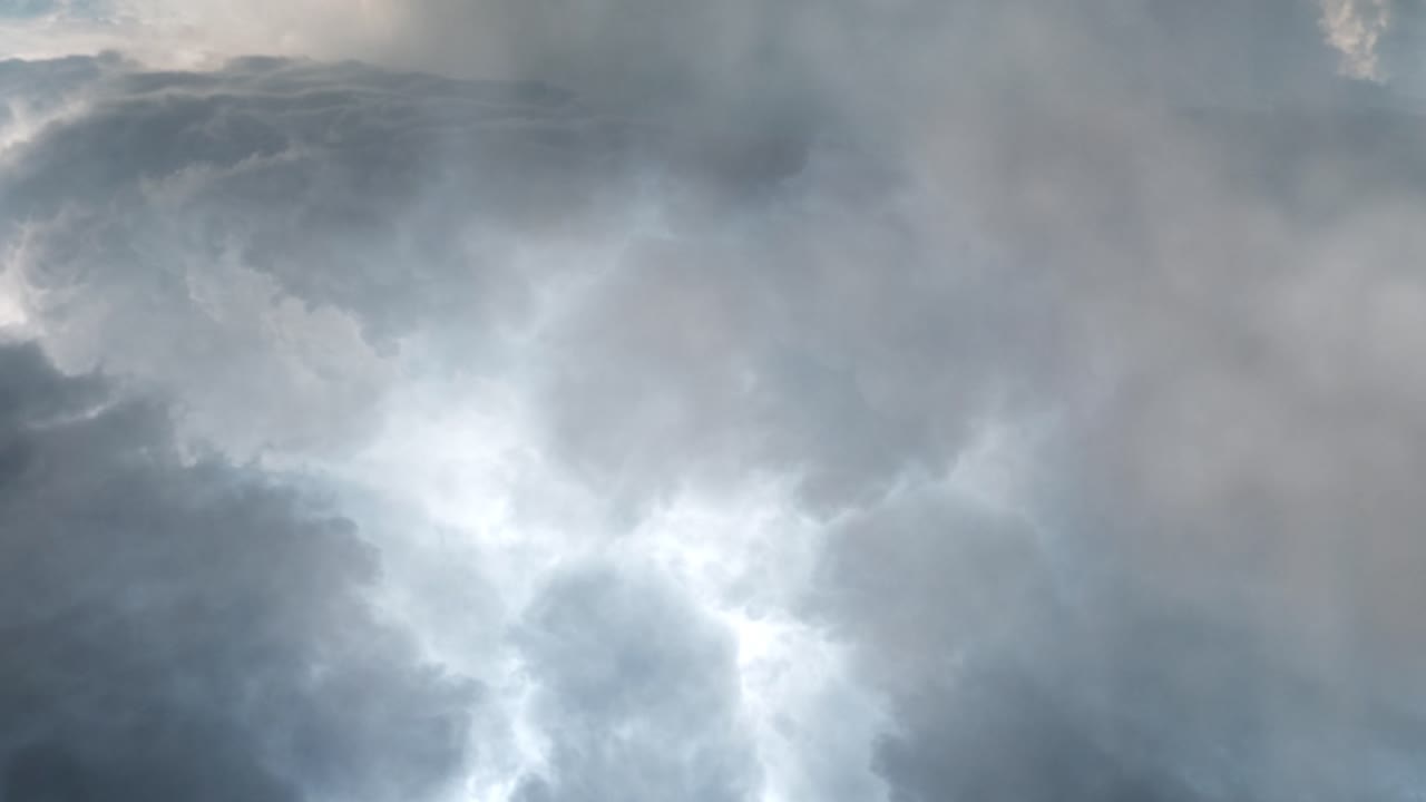 nature background, lightning storm at sunset in the dark sky.