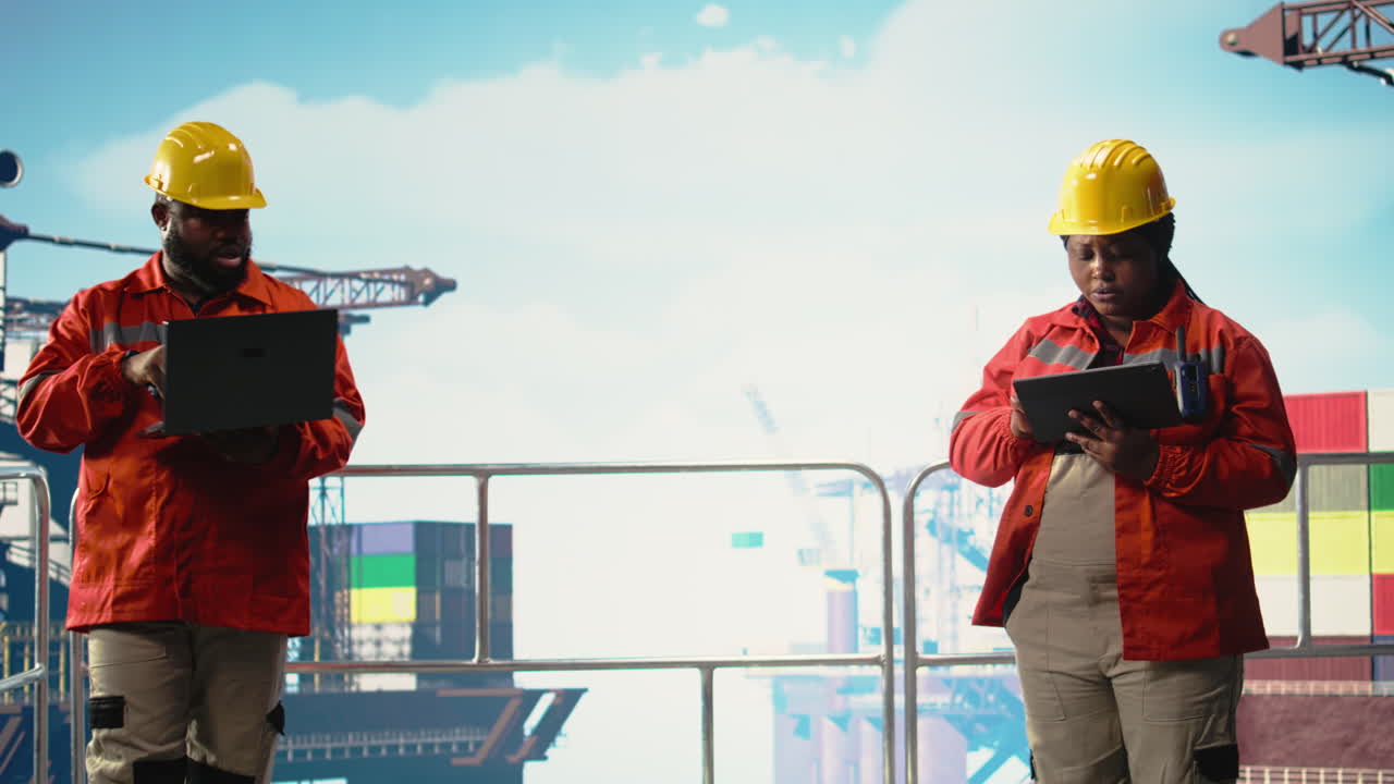 Vertical video Drilling rig technicians track oil production efficiency, coordinating checkup