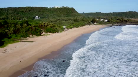 Beautiful-beach-waves-in-a-tropical-country_drone-shot