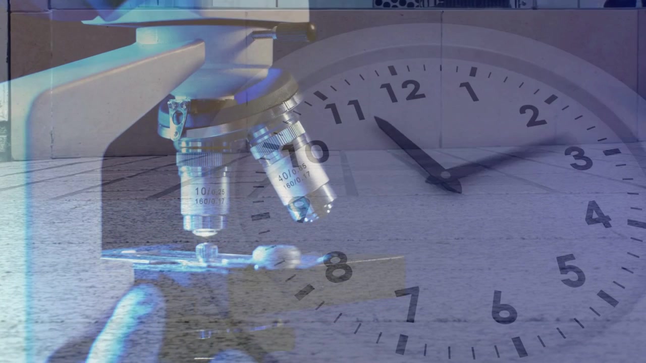Gloved lab tech reaching slide, adjusting scope while inspecting sample, clock overlay hands moving