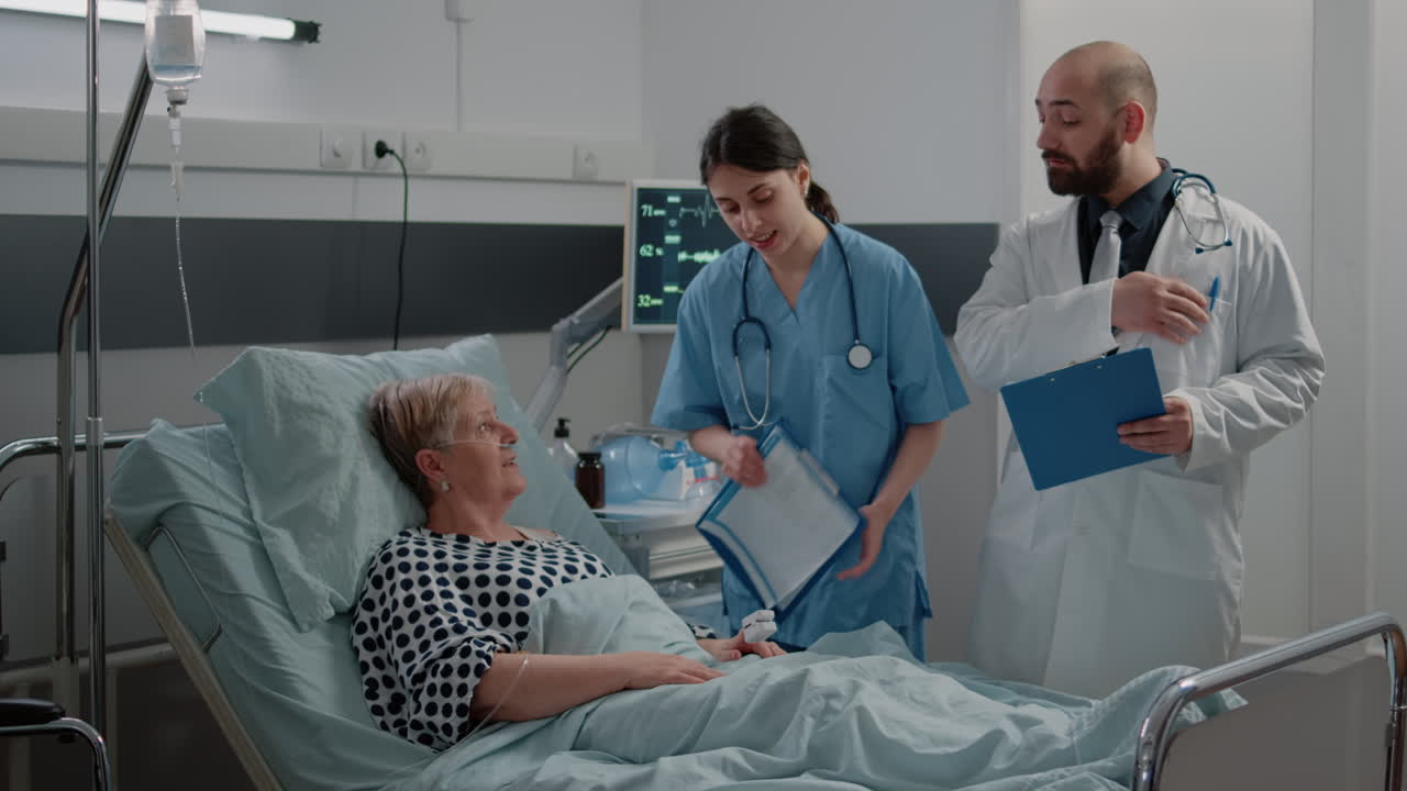 Medical team doing checkup visit for aged patient with disease
