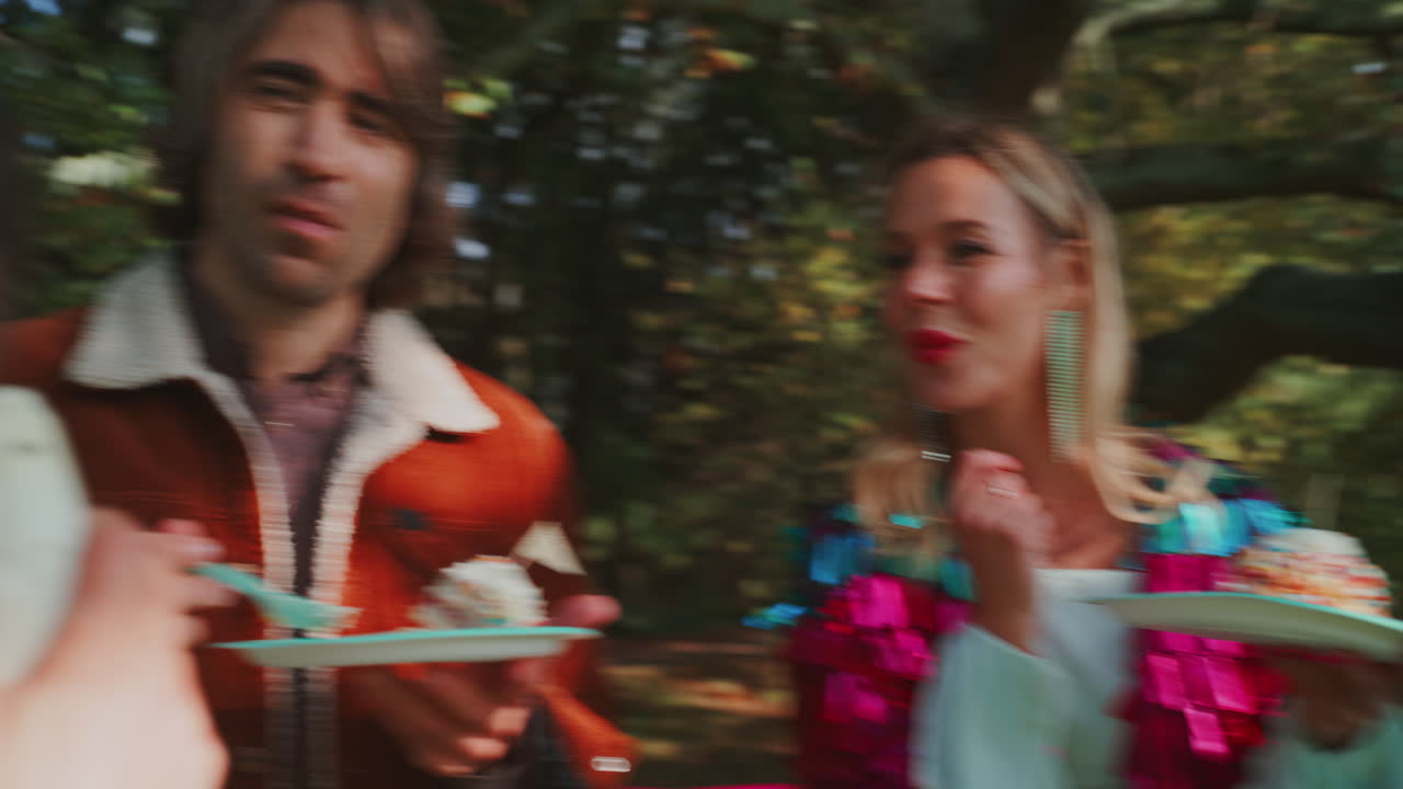 Friends Celebrating Birthday Outdoors