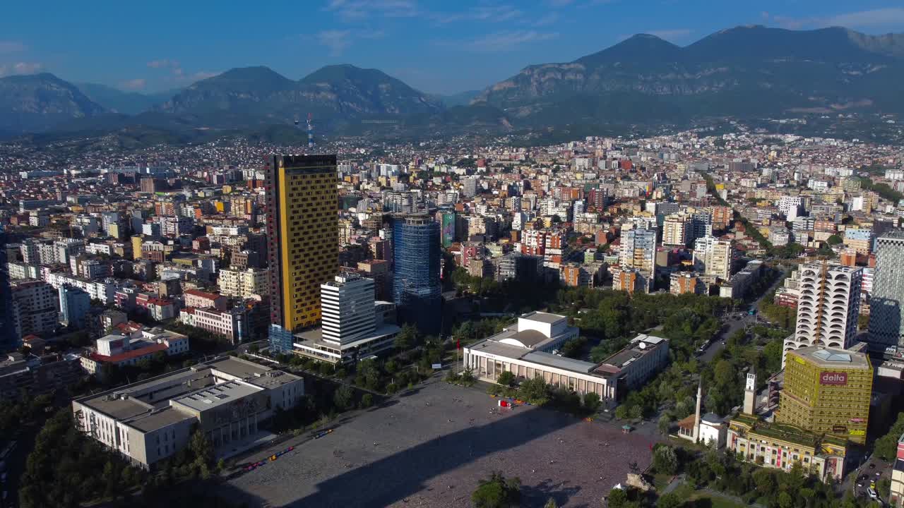 Aerial view of Skanderbeg Square with surrounding city and mountains - Tirana, Albania