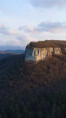 mountain peak with cross