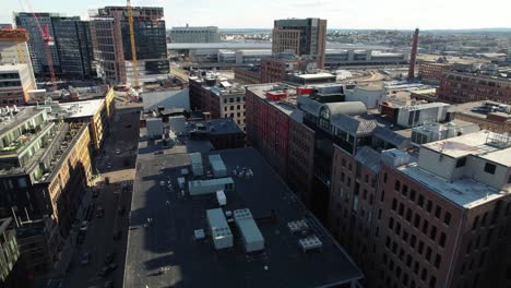 fort point neighbourhood aerial view across boston high rise downtown industrial city landscape