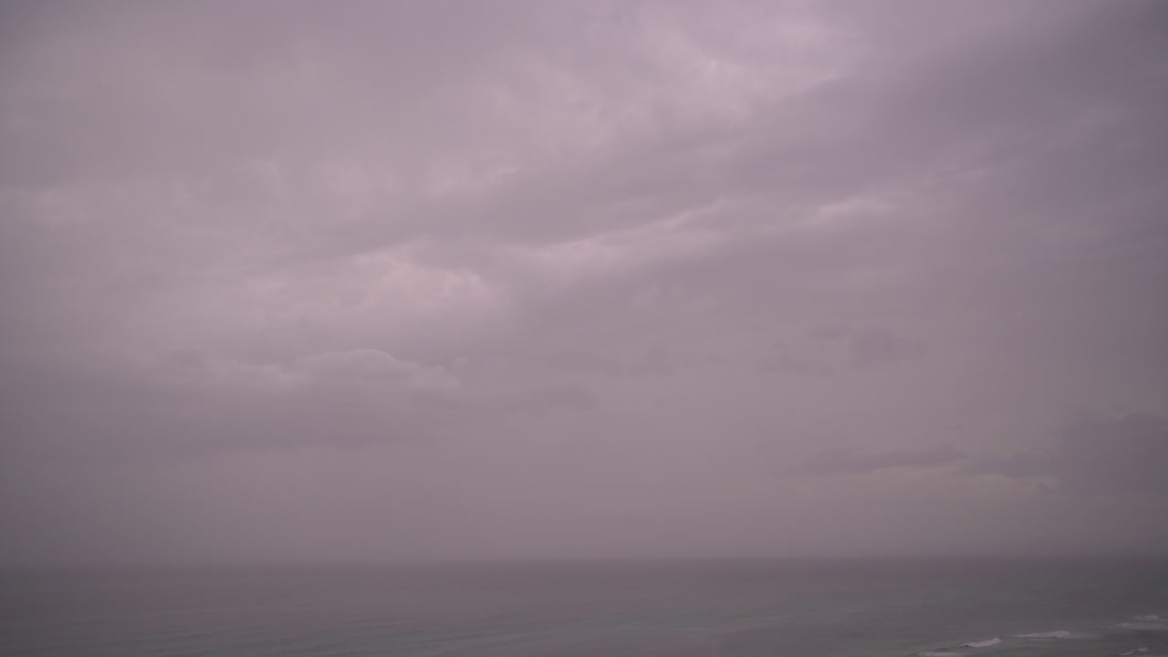 Clouds change over the Gulf of Mexico coastline in a timelapse