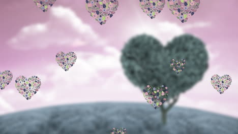 animation of heart icons floating over heart tree
