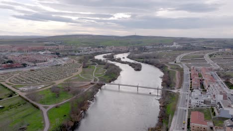 the tormes river in salamanca city, aerial drone view