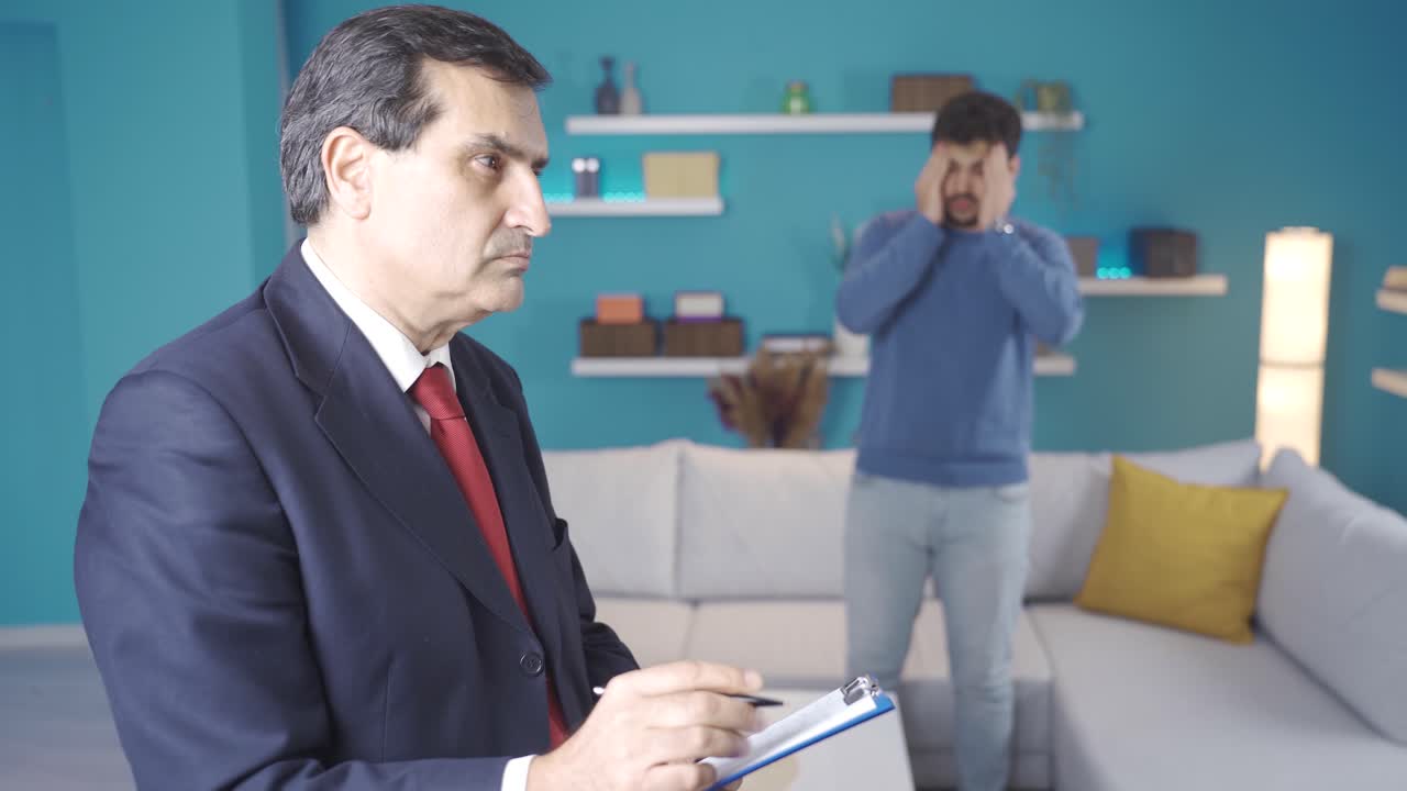 The young man whose house is foreclosed begs the bailiff and asks for luck.