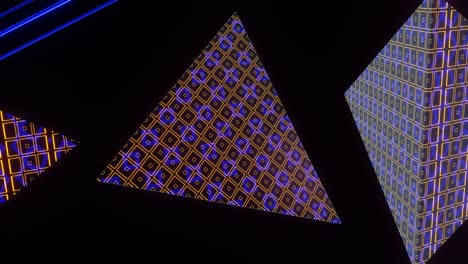 vj loops abstraction background of flying pyramids.