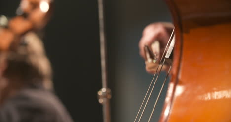 cello in orchestra musician playing cello