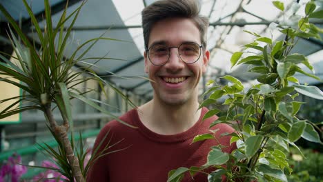 The-Joy-of-Botanical-Shopping:-Young-Man-Finds-Happiness-and-Beauty-in-a-Flower-Shop