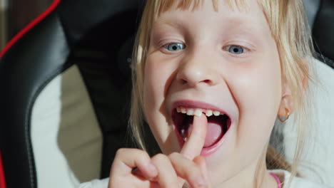 portrait of a girl shaking her finger with her finger