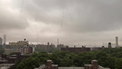 Rain-clouds-dump-their-contents-as-night-falls-over-Brooklyn,-NY,-time-lapse