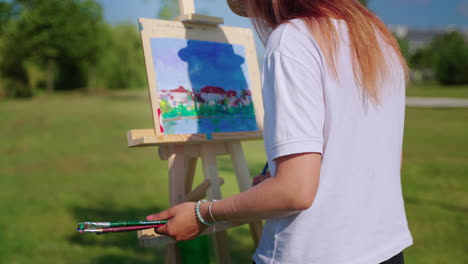 woman painting outdoors