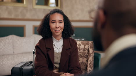 woman in a hotel room having a meeting