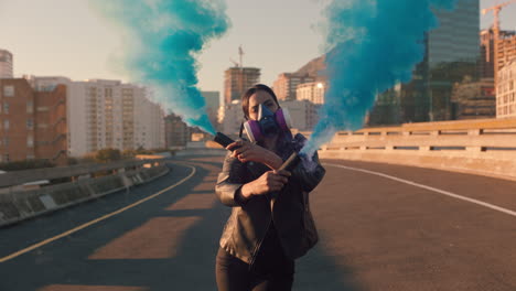 young woman dancing with smoke grenade wearing gas mask rebellious girl protesting against pollution with respirator for poisonous air global warming climate change emergency