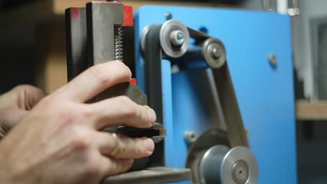 man working on a metalworking machine