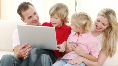 happy family buying online at home