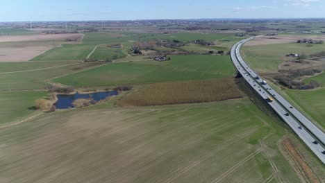 aerial push in along e6 highway near flädie, with lund in background